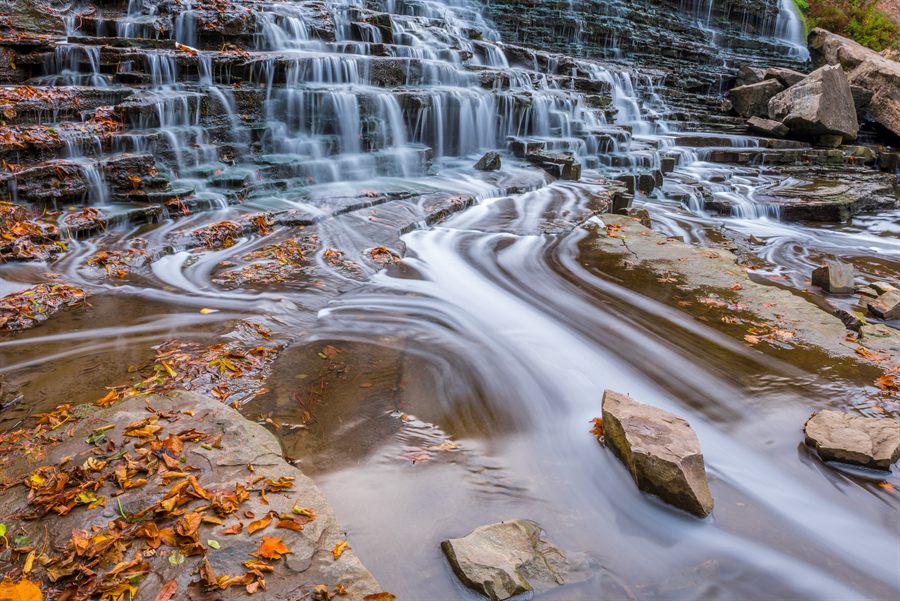 Waterfall with autumn leaves